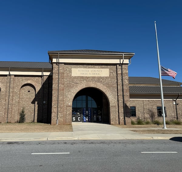 The flag outside Sumter County High School sits at half-mast on Wednesday, Jan. 8, 2025. Jimmy Carter’s political career started at Sumter County Schools. The first election he ever won was in 1955 for chairman of the school board, where he served for about seven years before becoming a state senator. (Mirtha Donastorg/AJC)