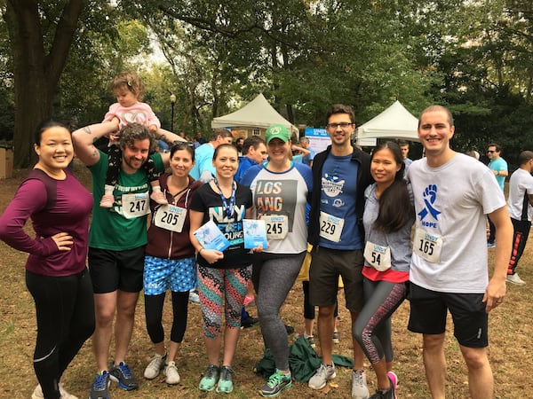 Tawny Mack (fourth from left) enjoys a moment with her friends and teammates following the Patient/Survivor Ceremony at Saturday’s Undy Run/Walk in Atlanta. CONTRIBUTED