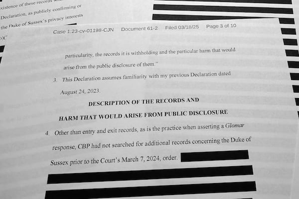 A heavily redacted declaration by Shari Suzuki is photographed Tuesday, March 18, 2025, as newly released court documents shed no fresh light on the circumstances under which Prince Harry entered the United States. (AP Photo/Jon Elswick)