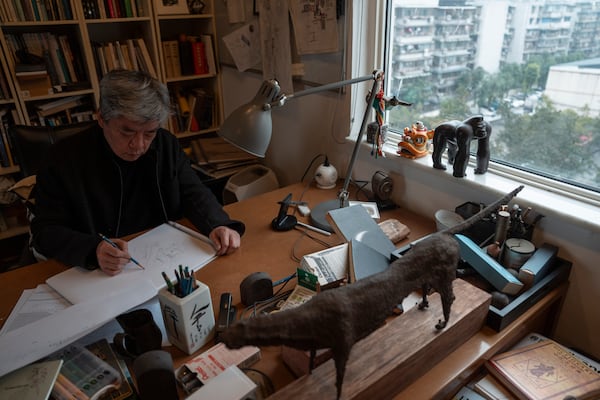 Pritzker Architecture Prize winner Chinese architect Liu Jiakun draws in his office in Chengdu in southwestern China's Sichuan province on Sunday, March 2, 2025. (AP Photo/Ng Han Guan)