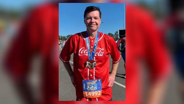 Jeff Hood, the Oconee County Republican Party vice chair, posed for a photo after completing the Walt Disney World Marathon on Sunday.