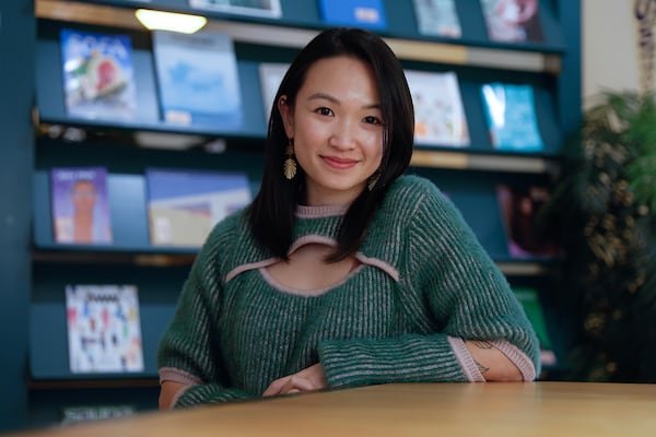 Artist and activist Kavi Vu blends her creative work with her passion to be an advocate for Atlanta's Asian community. The videographer and creative consultant plans to create a database of Asian artists in the city before she leaves for Vietnam in July.  (Natrice Miller/natrice.miller@ajc.com)