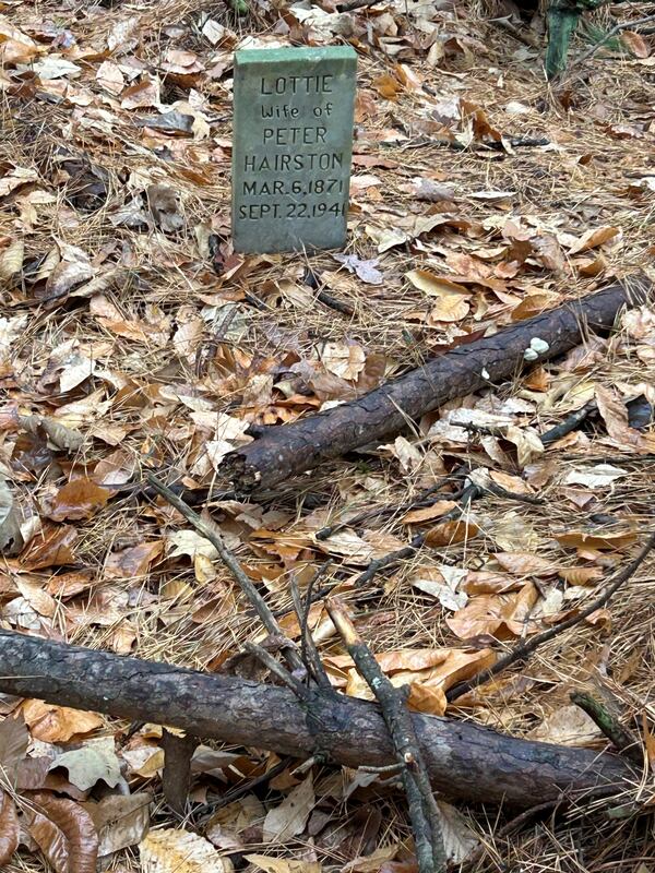 This photo provided by Jeff Bennett shows the grave of Lottie Hairston, Dec. 10, 2024, on the former Oak Hill plantation outside of Danville, Va. (Jeff Bennett via AP)