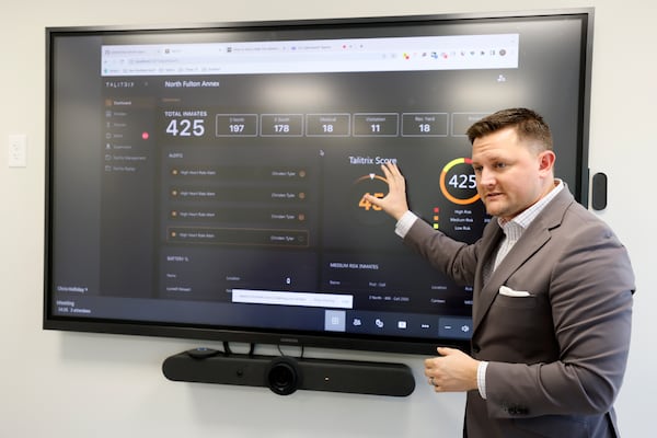 Talitrix CEO Justin Hawkins stands before a Talitrix data dashboard. Tuesday, May 2, 2023. Miguel Martinez /miguel.martinezjimenez@ajc.com