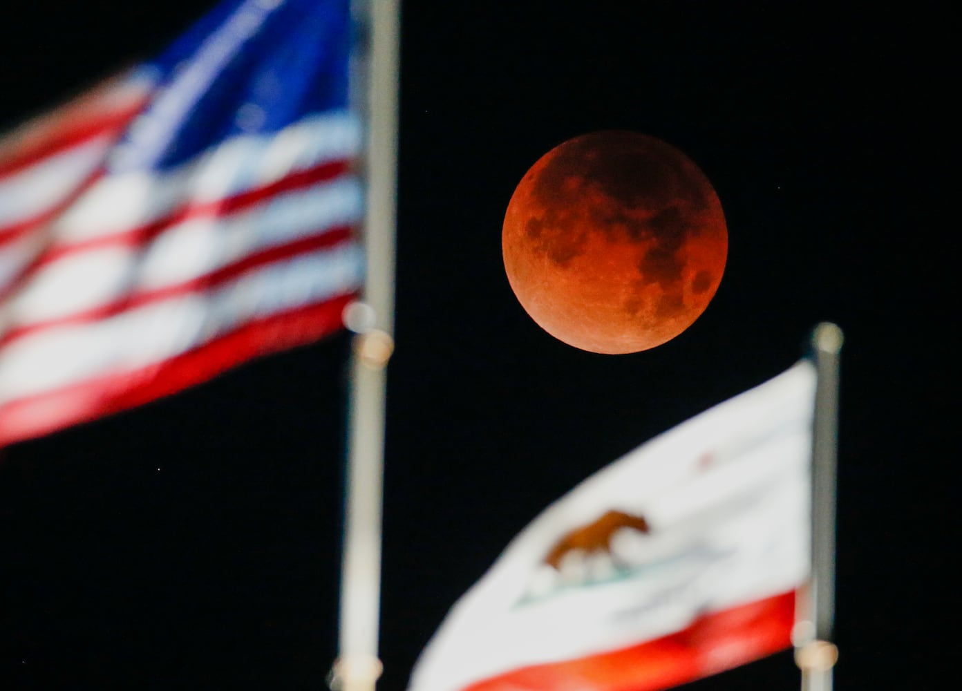 Photos: Super blue blood moon eclipse 2018