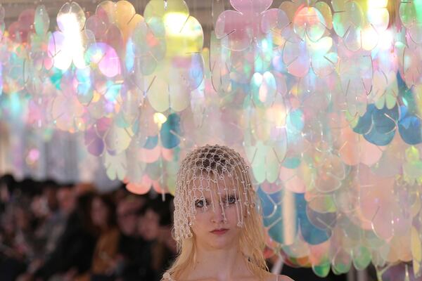 A model wears a creation as part of the Susan Fang Fall/Winter 2025-2026 Women's collection presented in Milan, Italy, Sunday, March 2, 2025. (AP Photo/Antonio Calanni)