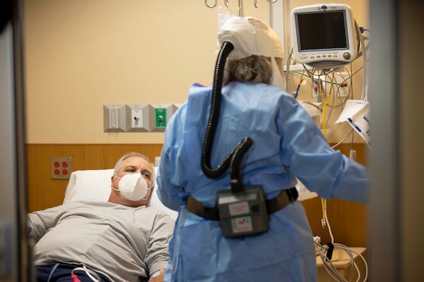 Ernest Todd White gets monoclonal antibody treatment at Floyd Medical Center, with help from registered nurse Lisa Sisson. (Contributed by Floyd Medical Center)