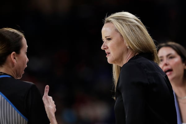 FILE - Utah head coach Lynne Roberts, right, speaks with an official during the second half of a second-round college basketball game against Gonzaga in the NCAA Tournament in Spokane, Wash., March 25, 2024. (AP Photo/Young Kwak, File)