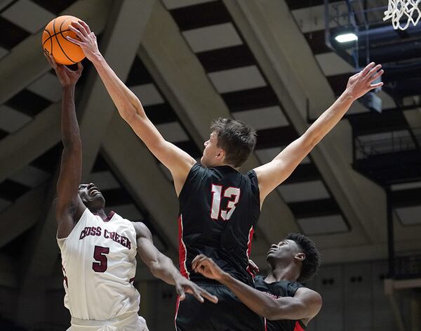 Woodward Academy Walker Kessler (13) averaged 17.8 points, 9.3 rebounds, 5.2 blocked shots, 1.3 steals and 1.2 assists during his senior season.