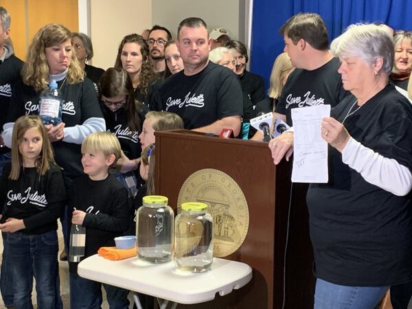 Residents of Juliette visited the state Capitol on Monday to connect with lawmakers and ask them to support bills that would require coal ash to be stored in lined landfills at Georgia Power plants across the state.