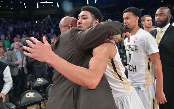  February 11, 2017 Atlanta - Georgia Tech's guard Josh Heath (11) gets a hug from his father Stan Heath, Boston College's assistant coach, after Georgia Tech defeated the Boston College at McCamish Pavilion on Saturday, February 11, 2017. HYOSUB SHIN / HSHIN@AJC.COM