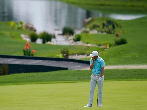 Jordan Spieth reacts after hitting the ball on the 18th fairway during the final round of the BMW Championship golf tournament, Sunday, Aug. 29, 2021, at Caves Valley Golf Club in Owings Mills, Md. (Julio Cortez/AP)