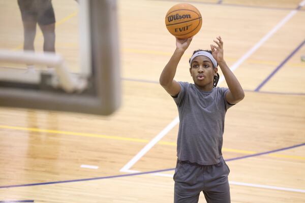 Eagle’s Landing High School sophomore Christian Spencer practices free throws on the JV basketball team, Wednesday, December 21, 2022, in McDonough, Ga.. Spencer, who has autism, overcame the odds to earn a spot on the Eagle’s Landing JV basketball team. (Jason Getz / Jason.Getz@ajc.com)