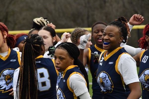 Reinhardt University players huddle during one of the first games of their inaugural season March 2.