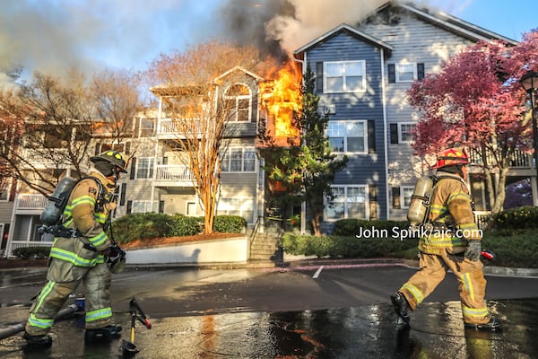 Flames were spotted shooting from a unit on an upper floor.