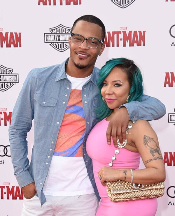 HOLLYWOOD, CA - JUNE 29: T.I. and Tameka 'Tiny' Cottle-Harris arrive at the Los Angeles Premiere of Marvel Studios 'Ant-Man' at Dolby Theatre on June 29, 2015 in Hollywood, California. (Photo by Jason Merritt/Getty Images)