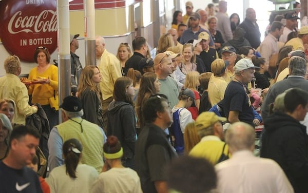 Crowds line up to taste The Varsity's famous hot dogs and Frosted Oranges and hear the iconic question, "What'll ya have?"