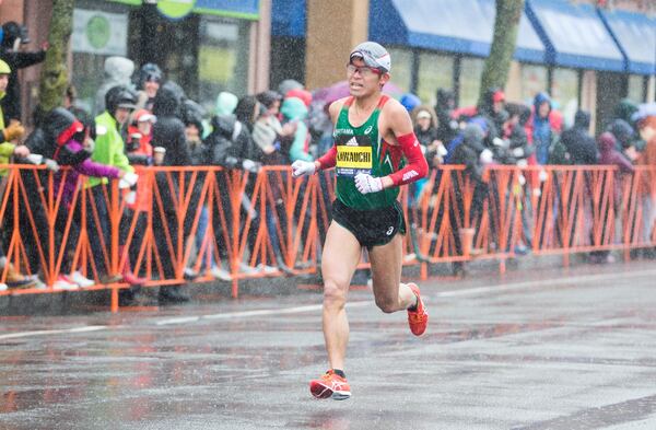 BROOKLINE, MA - APRIL 16:  Yuki Kawauchi approaches the 24 mile marker of the 2018 Boston Marathon on April 16, 2018 in Brookline, Massachusetts. He won the race, his first major marathon win, with an unofficial time of 2:10:46.  (Photo by Scott Eisen/Getty Images)