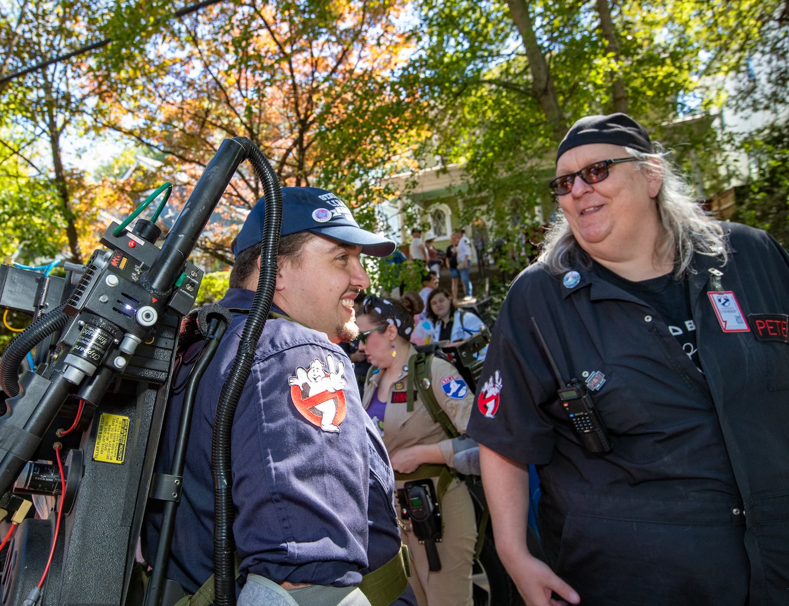 The Atlanta Ghostbusters, including Kevin Looney (left) and Brad Peters, gather on Euclid Avenue before the annual Little 5 Points Halloween Parade on Sunday, Oct 20, 2024. (Jenni Girtman for the AJC)