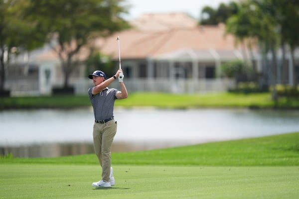 Jake Knapp hits the 18th hole during the first round of the Cognizant Classic golf tournament, Thursday, Feb. 27, 2025, in Palm Beach Gardens, Fla. (AP Photo/Rebecca Blackwell)