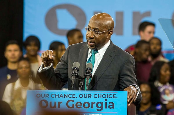 11/02/2018 -- Atlanta, Georgia -- Rev. Raphael G. Warnock, pastor of the historic Ebenezer Baptist Churchspeaks during a rally for gubernatorial candidate Stacey Abrams in Forbes Arena at Morehouse College, Friday, November 2, 2018.  (ALYSSA POINTER/ALYSSA.POINTER@AJC.COM)