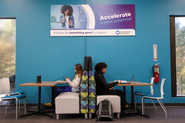 Students work at the Gwinnett County Acceleration Academies, Wednesday, Nov. 1, 2023, in Duluth. The Acceleration Academies gives Gwinnett County students who have dropped out of high school a chance to finish their diplomas in a more independent environment. (Jason Getz / Jason.Getz@ajc.com)