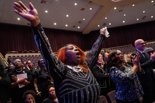 Fans and friends gather to celebrate the life of singer and actress Angie Stone, Friday, March 14, 2025, in Austell. Ga. (AP Photo/Olivia Bowdoin)