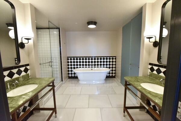 Restroom inside a suite on 17th floor of The Candler Hotel in downtown Atlanta. HYOSUB SHIN / HSHIN@AJC.COM