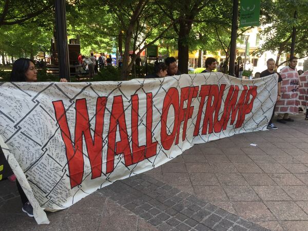 Protesters prepare to march from Woodruff Park on April 24, 2019 near where Donald Trump is scheduled to speak at summit on the opioid crisis.