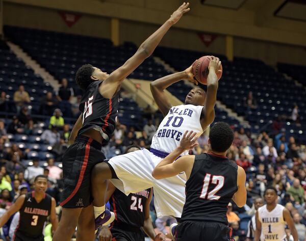 Miller Grove Wolverines Naquante Hardy (10) shoots as the Miller Grove Wolverines play the Allatoona Buccaneers in the Class AAAAA boys championship at the Macon Coliseum Friday, March 4, 2016. The Wolverines beat the Buccaneers 50-48, for their 7th title in 8 years. KENT D. JOHNSON/ kdjohnson@ajc.com