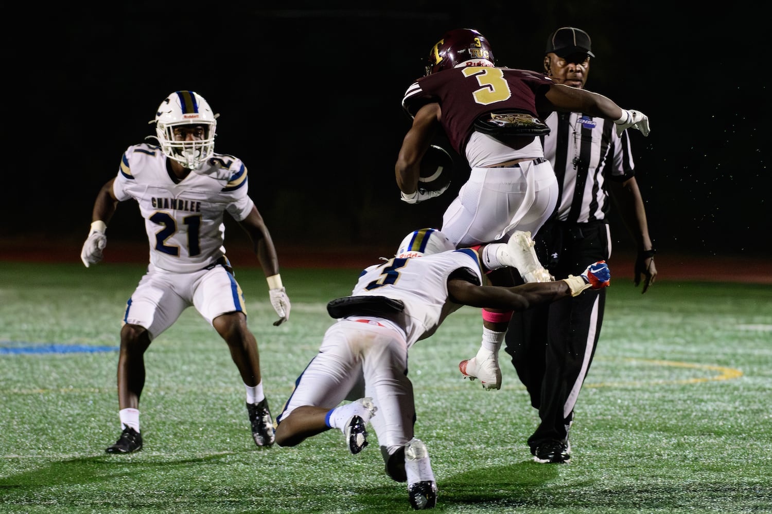 Tucker's Jordan Mccoy avoids a tackle during the game against Chamblee, October 6, 2023. (Jamie Spaar for the Atlanta Journal Constitution)