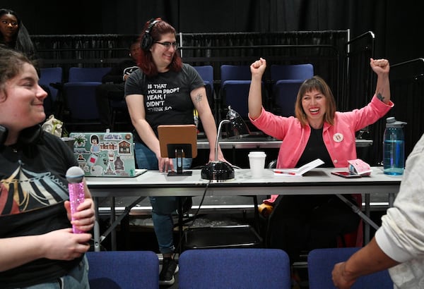 Megan Tabaque (right), playwright and director, reacts as she directs during a rehearsal at Mary Gray Munroe Theater, Friday, March 31, 2023, in Atlanta. Megan Tabaque, a playwriting fellow at Emory University, is the creator and director behind a new play “Britney Approximately: A Pop Greek Tragedy,” which will be at the Mary Gray Munroe Theater at Emory University from April 6 to 16. (Hyosub Shin / Hyosub.Shin@ajc.com)