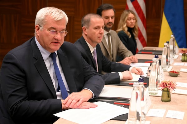 Ukraine's Foreign Minister Andrii Sybiha, left, waits for the start of a meeting with United States Secretary of State Antony Blinken in Brussels, Wednesday, Nov. 13, 2024. (Nicolas Tucat, Pool Photo via AP)