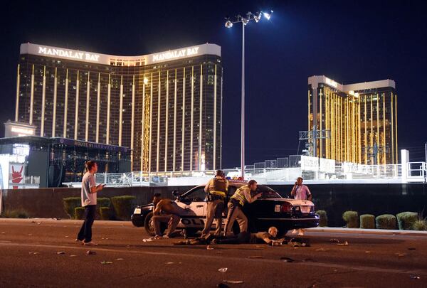 LAS VEGAS, NV - OCTOBER 01:   Las Vegas police stand guard along the streets outside the Route 91 Harvest Country music festival groundss of the Route 91 Harvest on October 1, 2017 in Las Vegas, Nevada.  There are reports of an active shooter around the Mandalay Bay Resort and Casino.  (Photo by David Becker/Getty Images)