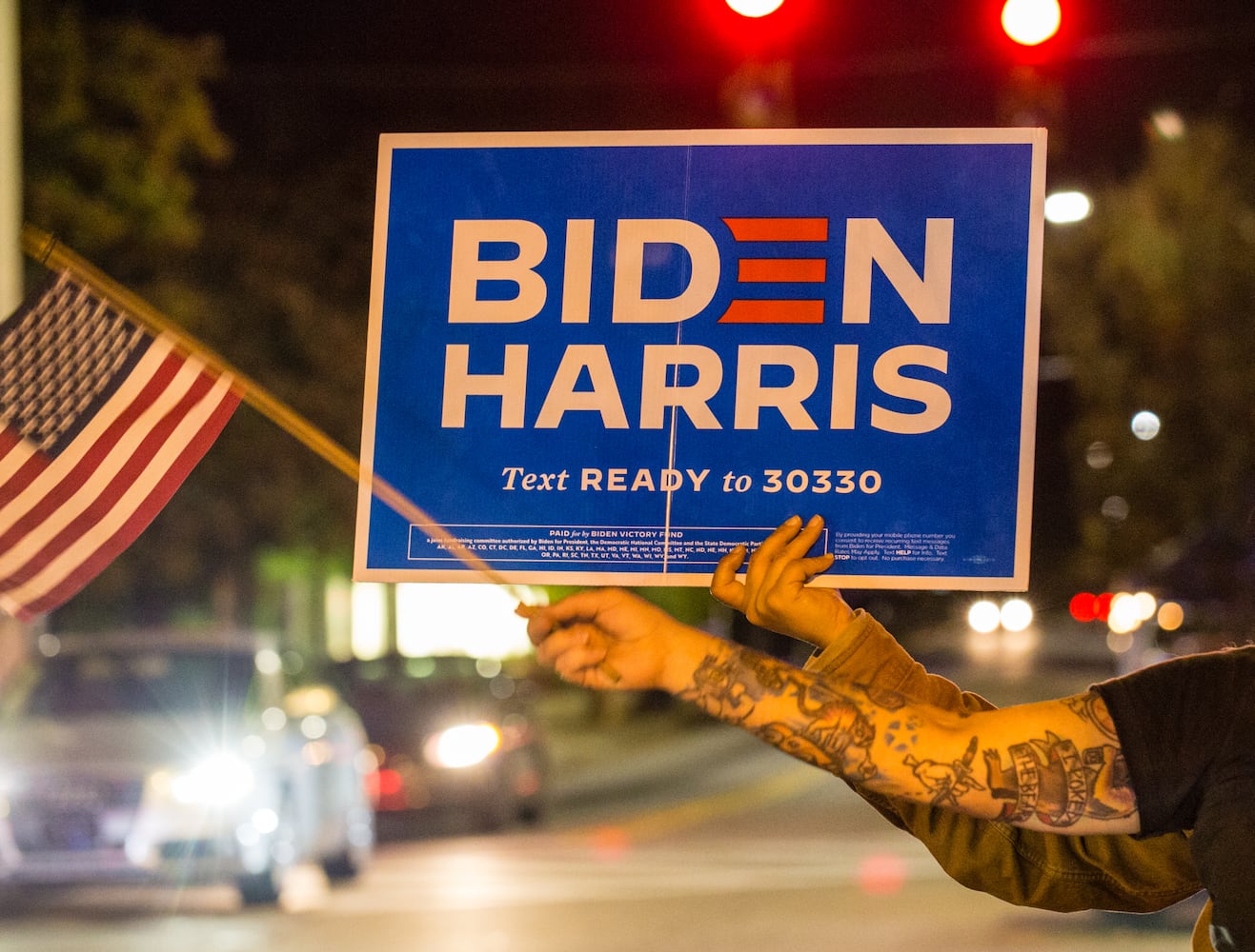 As elections results become more clear, Biden supporters take to the streets in Decatur and East Altanta to celebrate President-Elect Joe Biden and his VP Kamala Harris on Saturday, Nov 7, 2020.  (Jenni Girtman for The Atlanta Journal-Constitution)