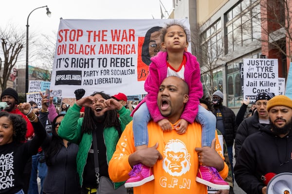 Protestors marched on Saturday, January 28, 2023 against the killing of Tyre Nichols by Memphis police. Dozens of protestors gathered and marched through downtown from Centennial Olympic Park in Atlanta. (Arvin Temkar / arvin.temkar@ajc.com)