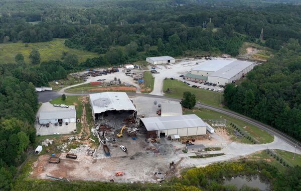 Aerial photo shows the remnants of Metro Site’s recycling facility that burned down last summer in Commerce. (Hyosub Shin / Hyosub.Shin@ajc.com)