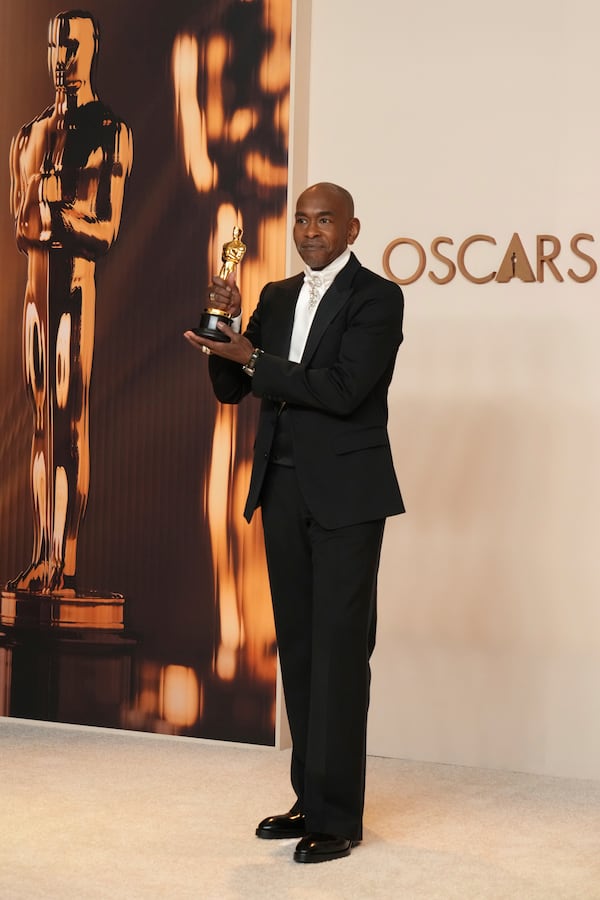 Paul Tazewell, winner of the award for best costume design for "Wicked," poses in the press room at the Oscars on Sunday, March 2, 2025, at the Dolby Theatre in Los Angeles. (Photo by Jordan Strauss/Invision/AP)