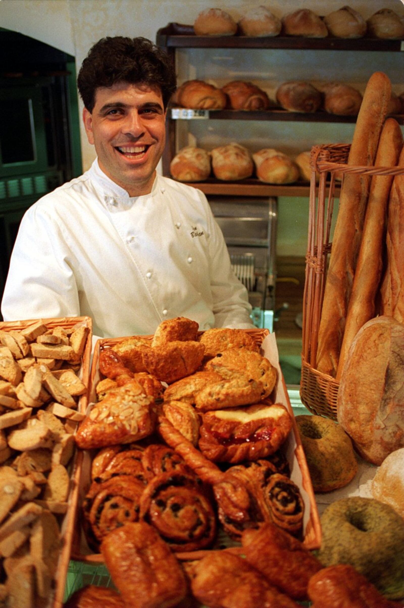 This 1996 photo shows Alon Balshan of Alon’s in his bakery on North Highland Avenue. AJC FILE PHOTO