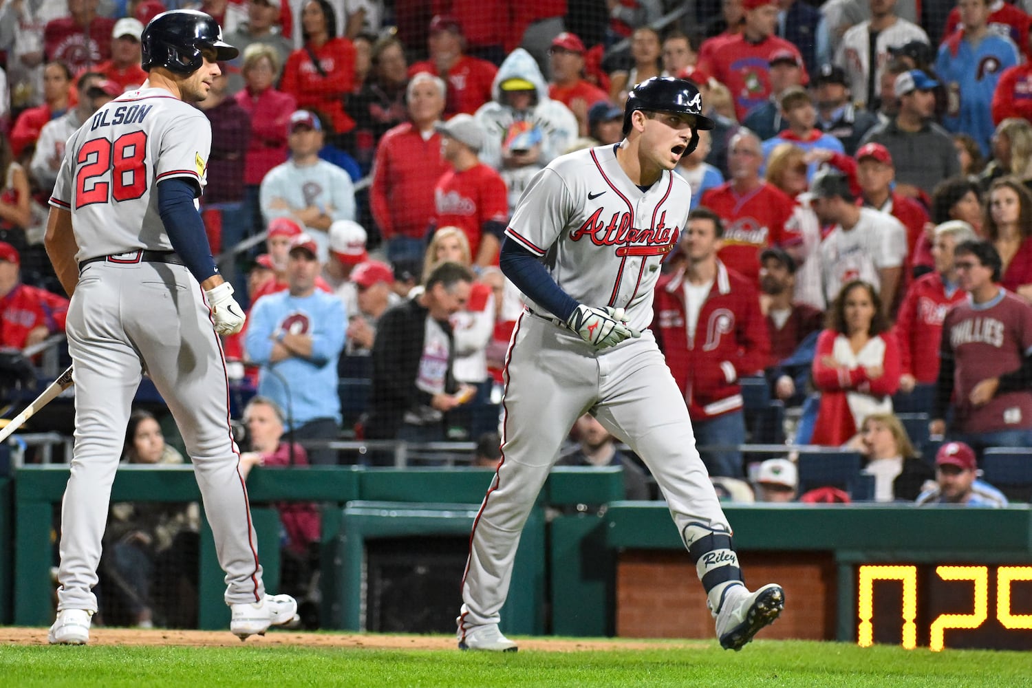 Atlanta Braves’ Austin Riley celebrates with Matt Olson (28) after a solo home run against the Philadelphia Phillies during the fourth inning of NLDS Game 4 at Citizens Bank Park in Philadelphia on Thursday, Oct. 12, 2023.   (Hyosub Shin / Hyosub.Shin@ajc.com)