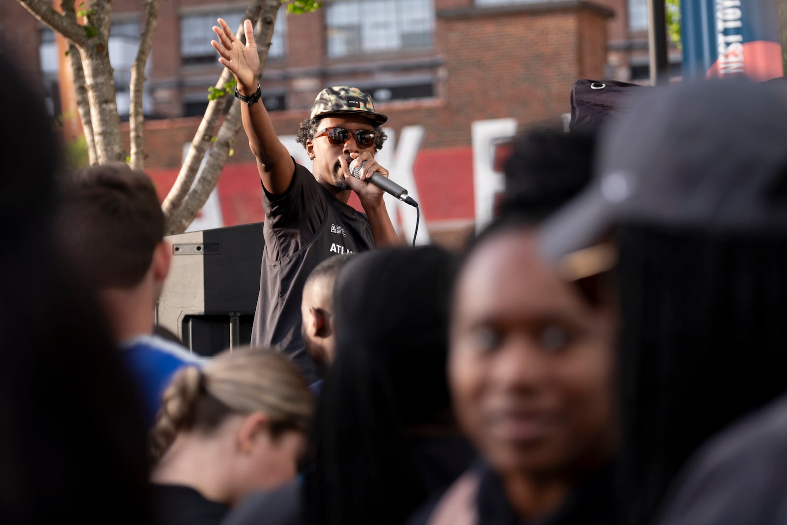 Maurice Garland, a run lead with the Atlanta Run Club, gives instructions before the start of their Monday night run at Ponce City Market on Monday, March 25, 2024.   (Ben Gray / Ben@BenGray.com)