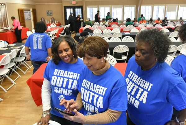 February 22, 2020 Acworth - Graduates from Summer Hill HS (from left) Darlene Smith, Faye Jones and Sharon Jones share their group photograph during an annual Memories Day, Black High School Reunion, at George Washington Carver Park in Acworth on Saturday, February 22, 2020. Bartow County celebrated Black History Month with its annual Memories Day at George Washington Carver Park, a segregated park affectionately known by its black patrons as The Beach. Residents gathered for a program that will reflect on the significance of The Beach in Civil Rights history, as well as share fondest memories of the surrounding Black high schools. (Hyosub Shin / Hyosub.Shin@ajc.com)