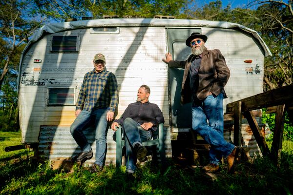 Ben Reynolds (from left), Alan Cowart and Brant Slay of Athens-born roots rock band Chickasaw Mudd Puppies.
Courtesy of Jason Thrasher.