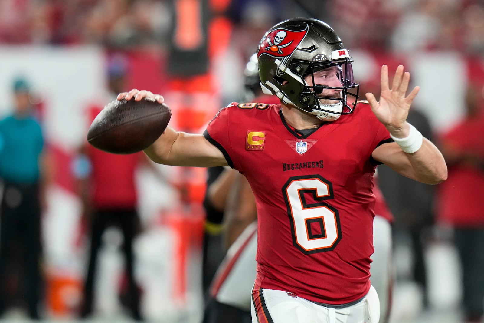 Tampa Bay Buccaneers quarterback Baker Mayfield (6) looks to throw during the second half of an NFL football game against the Baltimore Ravens, Monday, Oct. 21, 2024, in Tampa, Fla. (AP Photo/Chris O'Meara)