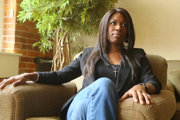 Ashley Diamond, the transgender woman who has made national headlines for her legal battle against Georgia's prison system, answers questions during an AJC interview after being paroled in 2015. Curtis Compton / ccompton@ajc.com