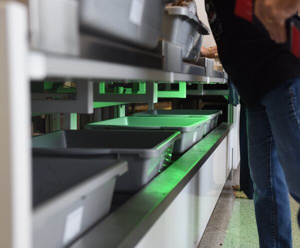 June 5, 2019 Atlanta - Two new TSA smart lanes at the international terminal at Hartsfield-Jackson are aimed at making it easier for travelers to get through screening. The new lanes are equipped with CT machines, which allow passengers to keep all items in their bags instead of removing them and putting them into bins. The bin-loading area also has lights that indicate when a station is open for a passenger to begin loading a bin. RYON HORNE/RHORNE@AJC.COM