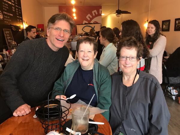  Kevin Avery, morning host at the Fish, joins Becky (center) and Anita Griewisch are loyal Fish listeners who live in Kennesaw. CREDIT: Rodney Ho/rho@ajc.com