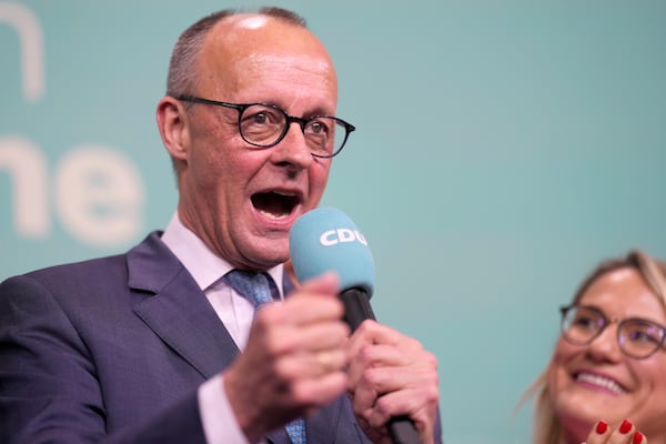 Friedrich Merz, the candidate of the mainstream conservative Christian Democratic Union party, gestures while addressing supporters at the party headquarters in Berlin, Germany, Sunday, Feb. 23, 2025, after the German national election. (AP Photo/Markus Schreiber)