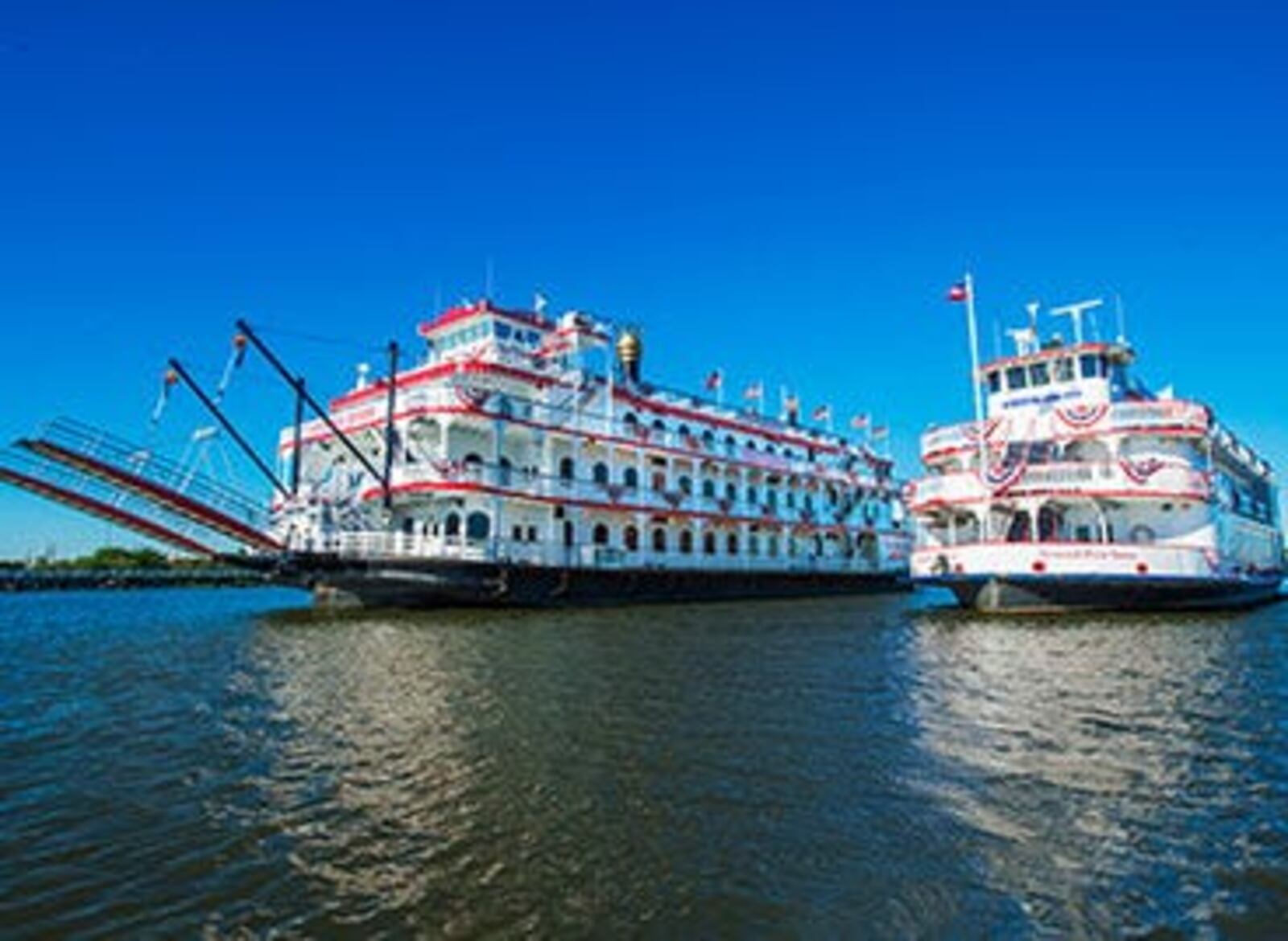 Savannah Riverboat Cruises' Georgia Queen and Savannah River Queen float alongside one another. The cruise line will host their annual Thanksgiving Dinner Cruise at 11:30 a.m. and 4 p.m. on Thursday Nov. 23, 2023