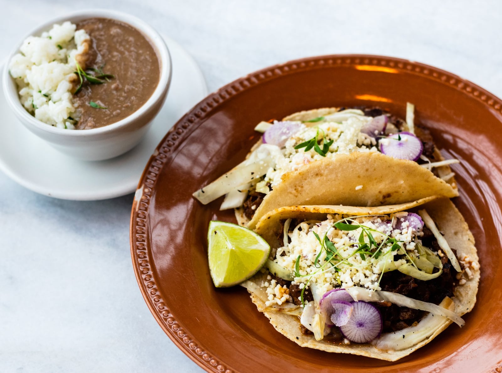 Pork cheek tacos at Good Word Brewing are flavorful and filling, perfect for soaking up a few beers. CONTRIBUTED BY HENRI HOLLIS